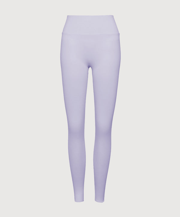 Lavender leggings on a light gray background